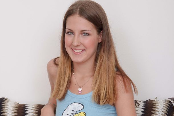 Safo lifting her blue top up revealing her perky breasts