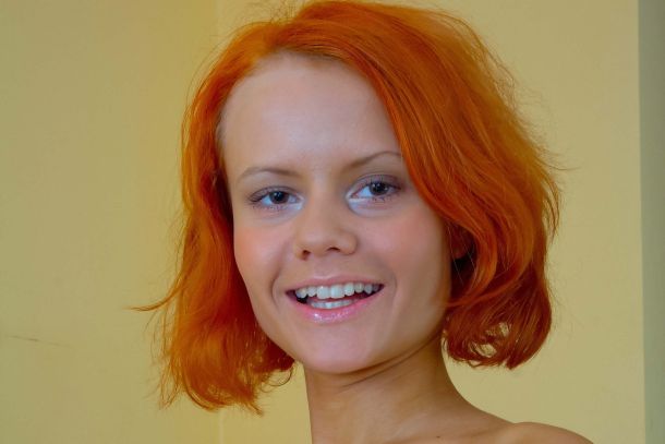 Kerry appearing topless to the camera.