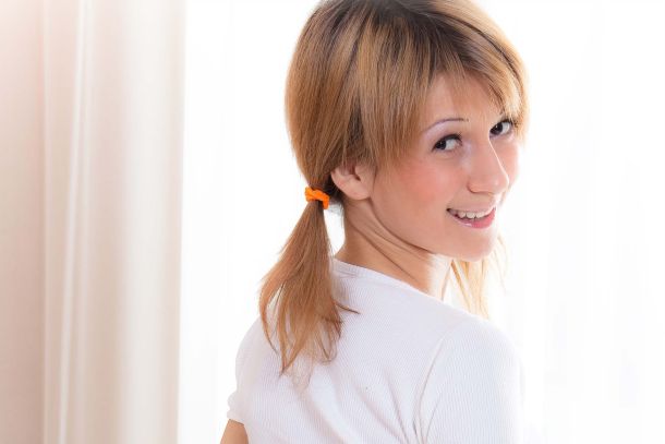 profile picture of nina lifting her top revealing her small breasts